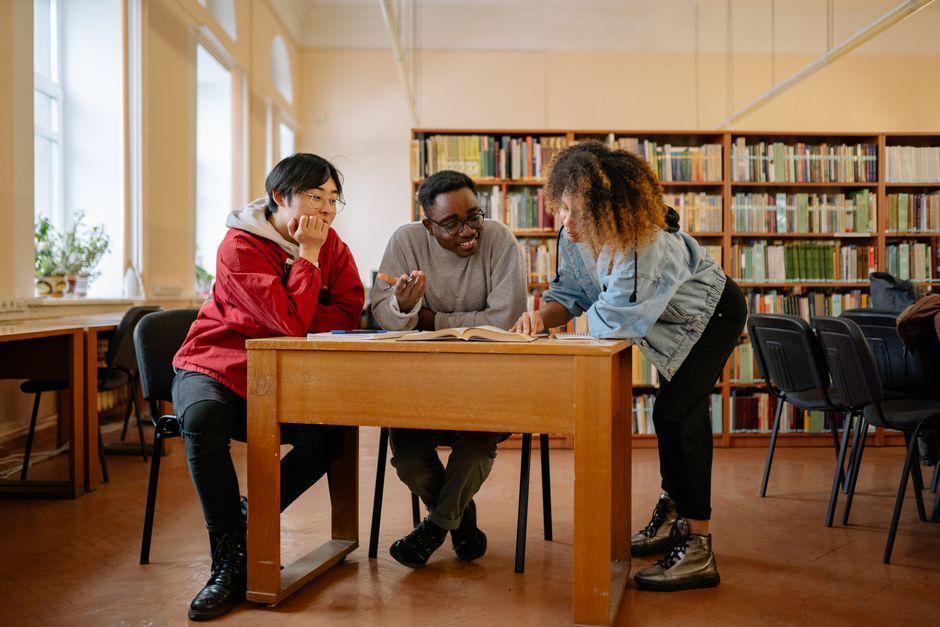 Philosophy lecture hall with students engaged in discussion