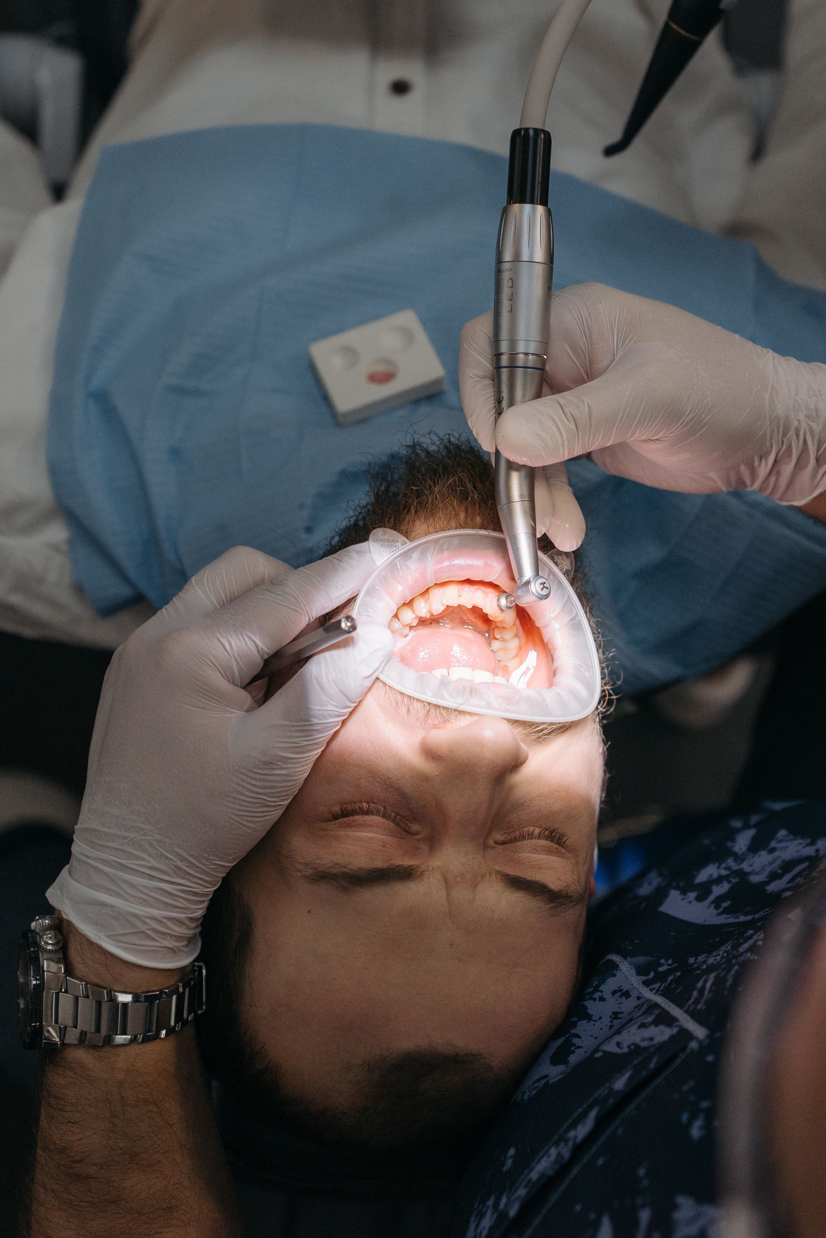 Dental student practicing on a model