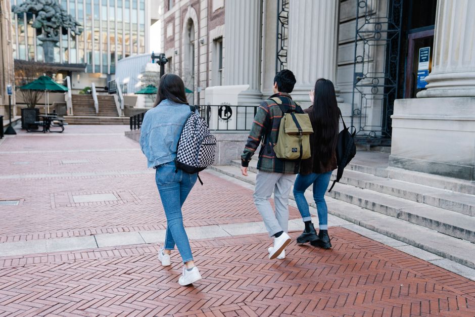 Columbia University campus with students walking near Low Library
